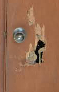 photo of a damaged door